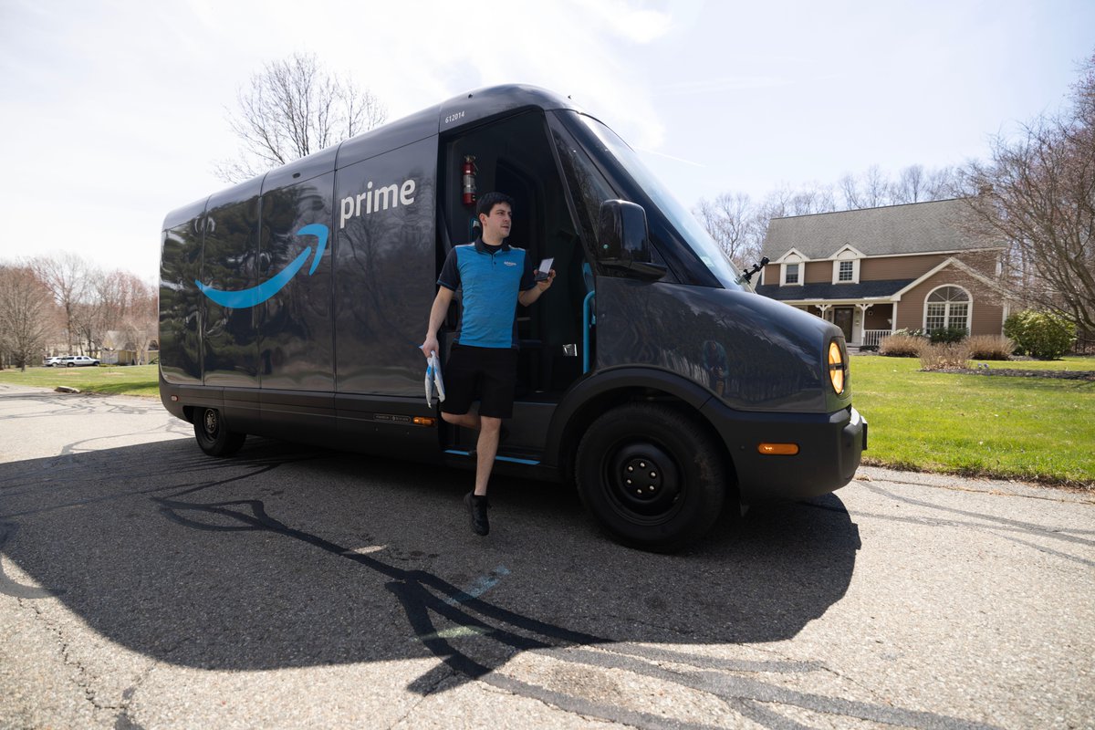 amazon's tweet photo. Meet Adam, a delivery driver for Amazon. 👋 📍 🗺️ 📦

He took us along on his route to show what a typical day is like, what he loves most about his job, and what makes our electric delivery vans designed by @Rivian so great. ➡️ https://t.co/Oy4bHVxoO6 https://t.co/di25rSjN4N