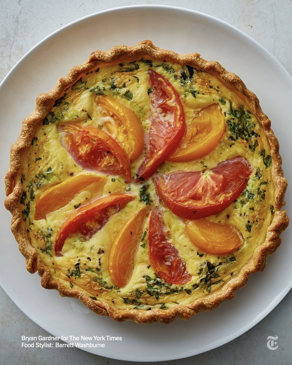 nytimes's tweet photo. "It tasted as wonderful as it looked." This heirloom tomato tart is what summer dreams are made of. https://t.co/XSDpkbf5Vs https://t.co/Ql49kIWiov