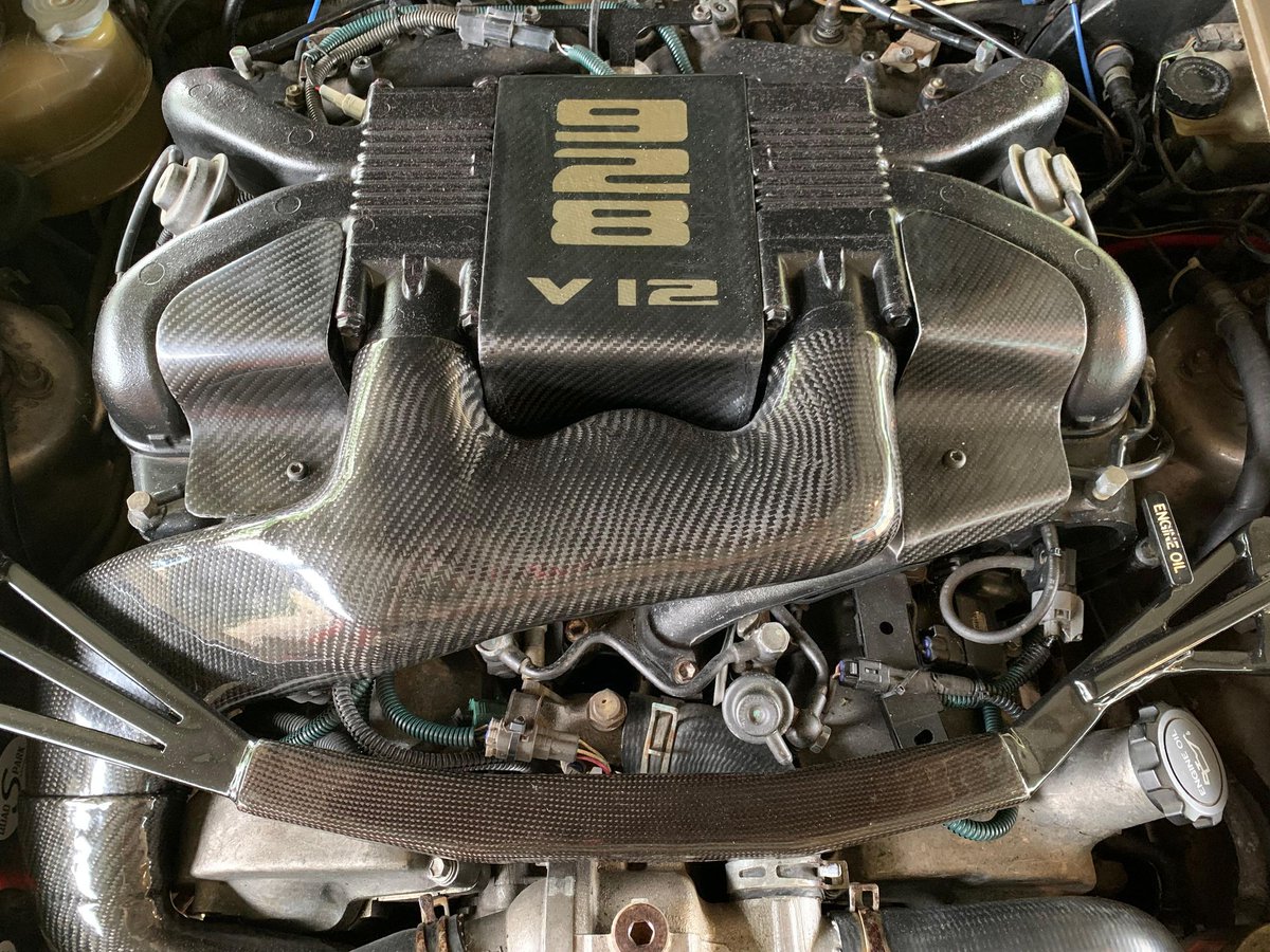 DougDeMuro's tweet photo. Actual thing on @CarsAndBids right now: Porsche 928 with a V12 swapped from a Toyota Century. And a manual transmission from a C5 Chevy Corvette. Yes, this is real. Check it out: https://t.co/WexO2PvkLN https://t.co/3k7H9gtK9X