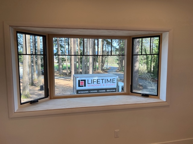 We spy a Lifetime work truck nestled in the Pacific Northwest trees!
How about those new windows, too? Stunning, don't you think?
Call us today if you want to enjoy the benefits of new windows in your home or business!
