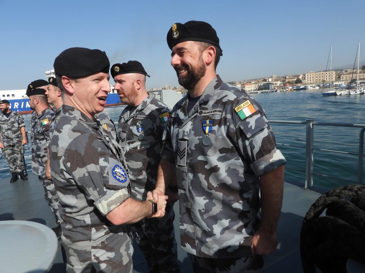 naval_service's tweet photo. The crew of L.É. William Butler Yeats receiving their Operation IRINI Medals alongside Catania, Sicily on successful completion of operations in the Central Mediterranean.

@LEWBYEATS
@AlanAlanflynn

#Navy #JoinOurTeam #BeMore
#EUNAVFORMED #OpIRINI https://t.co/s9RFk51Aqx