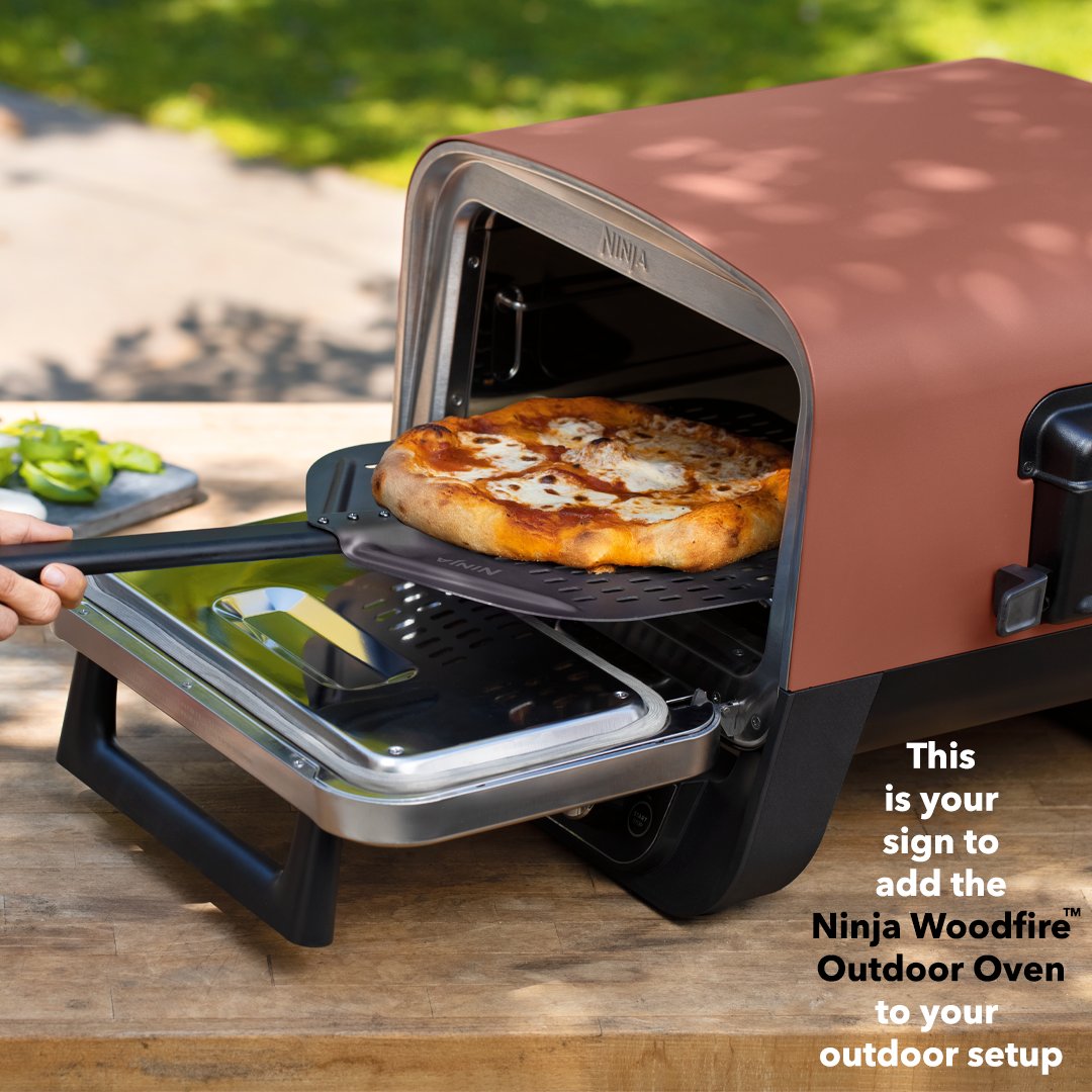 Cheers to backyard bangers ft. the Ninja Woodfire™ Outdoor Oven. #NinjaOutdoorOven #NinjaWoodfire