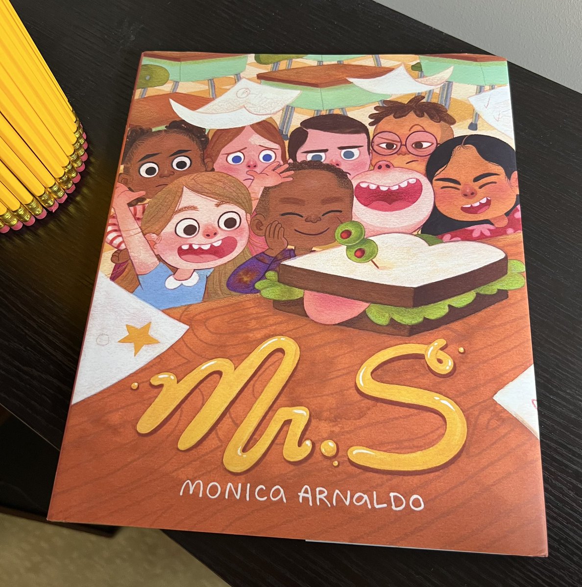 kmoorebooks's tweet image. In my almost #secondgrader’s words,

“I love this book!” 🥪 📚❤️

MR. S by @monicarnaldo is HILARIOUS 🫒 suspenseful🫒so much fun! 

Lots of 💎 to find in the art, too!😎😂😍

Gathering  #backtoschool supplies (yes, already!😭✏️) &amp;amp; this #picturebook got us excited to do so!❤️📚