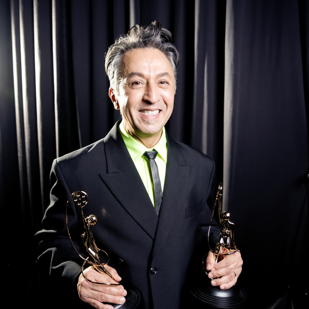 #local706 hair stylist Roberto Ramos holding two #MUAHSawards in his arms - he and fellow hair stylist Tara Copeland won the 2023 MUAHS Award for Best Hair Styling in Daytime Television for <a href="/KellyClarksonTV/">The Kelly Clarkson Show</a> ✨