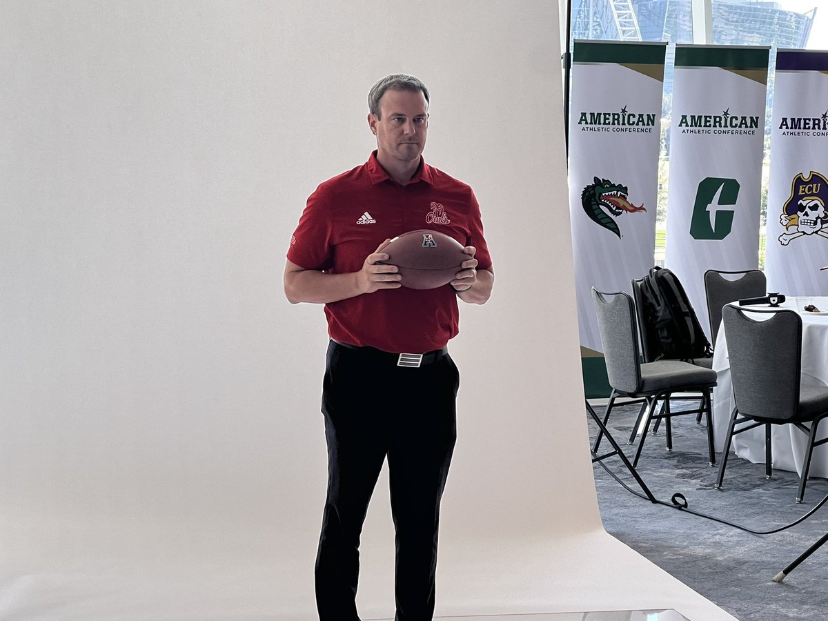 s_helwick's tweet photo. First-year FAU head coach Tom Herman poses at his first AAC media day https://t.co/8zsXqfUj9N