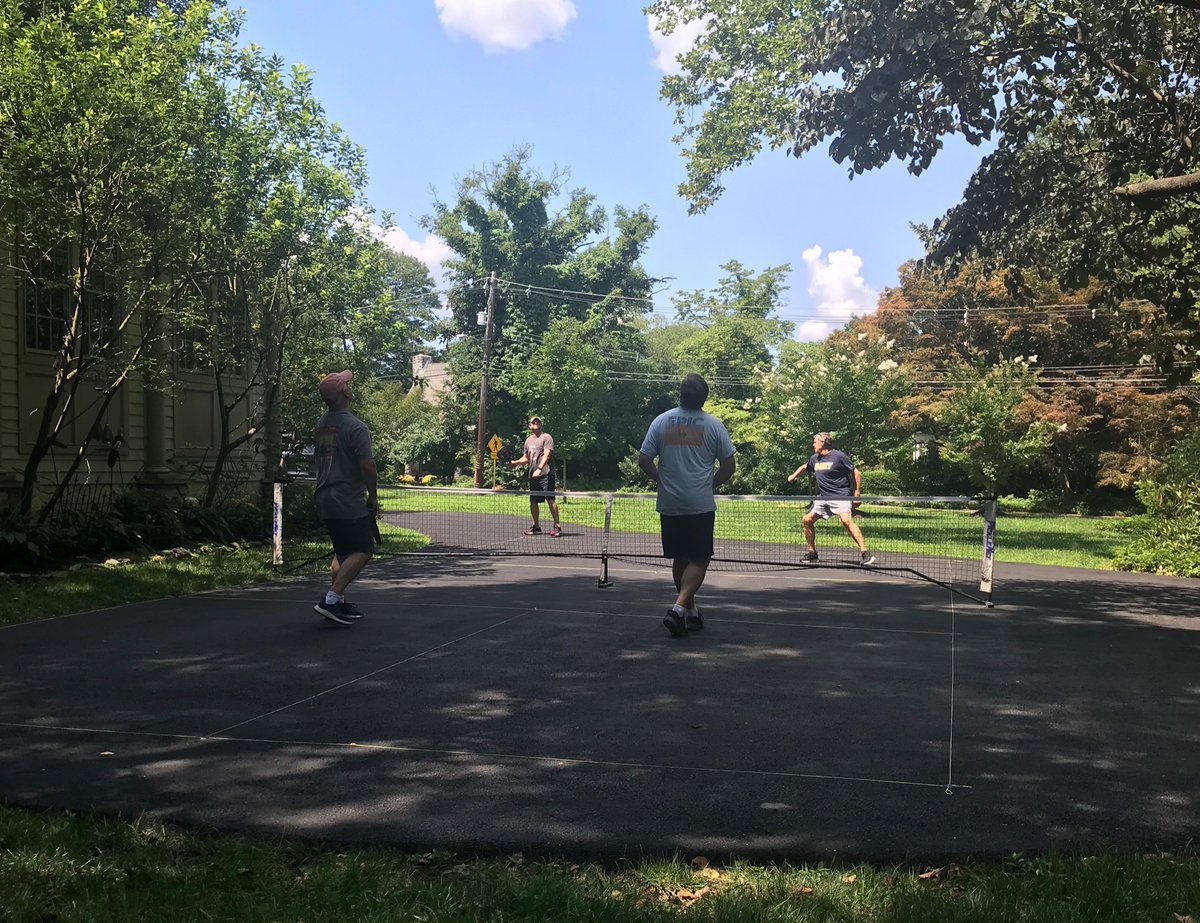 OnPickleball's tweet photo. We have new local pickleball courts, yet we still choose to set up our #pickleballonthego lines in the driveway. Why?

1. Shade and wind protection
2. We invite people we like
3. No waiting
4. BEER https://t.co/gmC7586oOv