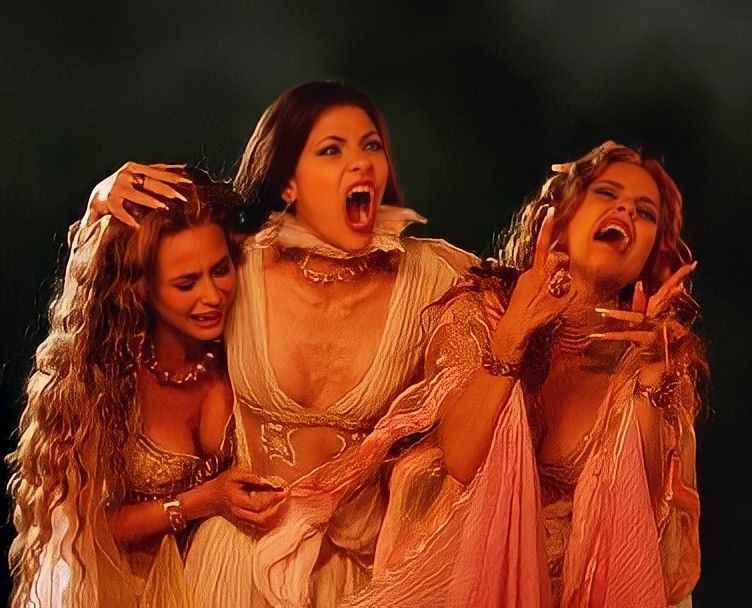 i will never forget the first time i saw dracula's brides in van helsing. gabriella pescucci's designs will haunt me forever. the drama. the cunt.