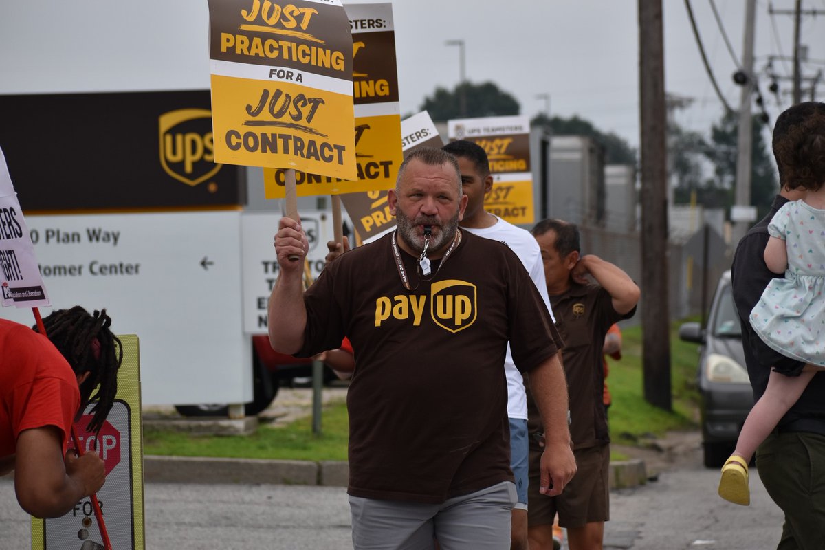 Teamsters's tweet photo. FED UP AND FIRED UP

The booming chants and whistles of @UPS #Teamsters are being heard across the country as the rank-and-file continues to shore up picket line discipline. 

#StrikeReady #1u https://t.co/FTlvEV3NWe