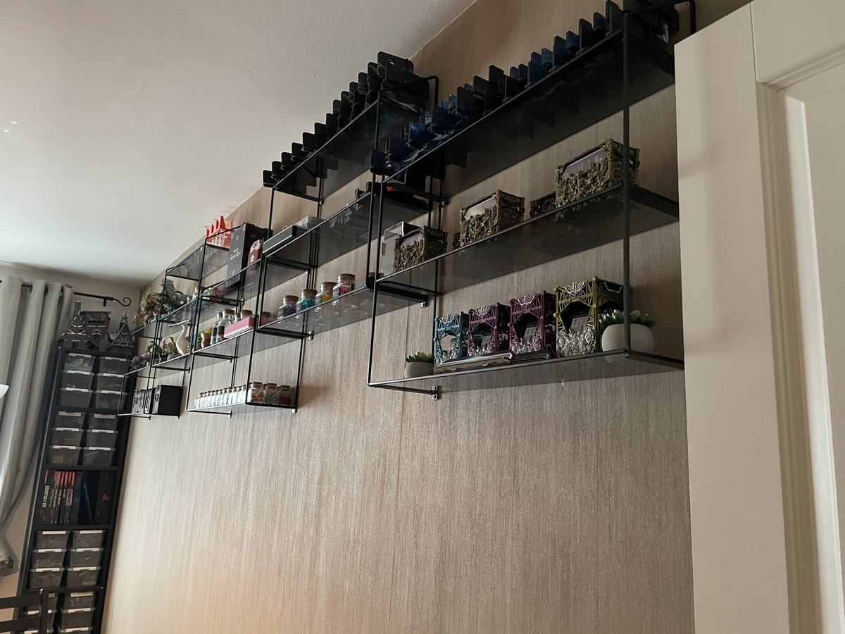 BoredGameDesign's tweet image. New shelving in the games room! I’m really happy with how much game accessory clutter was stored neatly away. Now to start hanging up my BGG artist posters underneath! ❤️