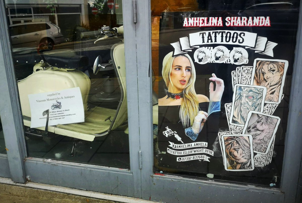 Happy to see our poster for Anhelina's tattoos in the window of <a href="/gamblingmaniw/">The Gambling Man</a>. Love seeing our work in the wild.