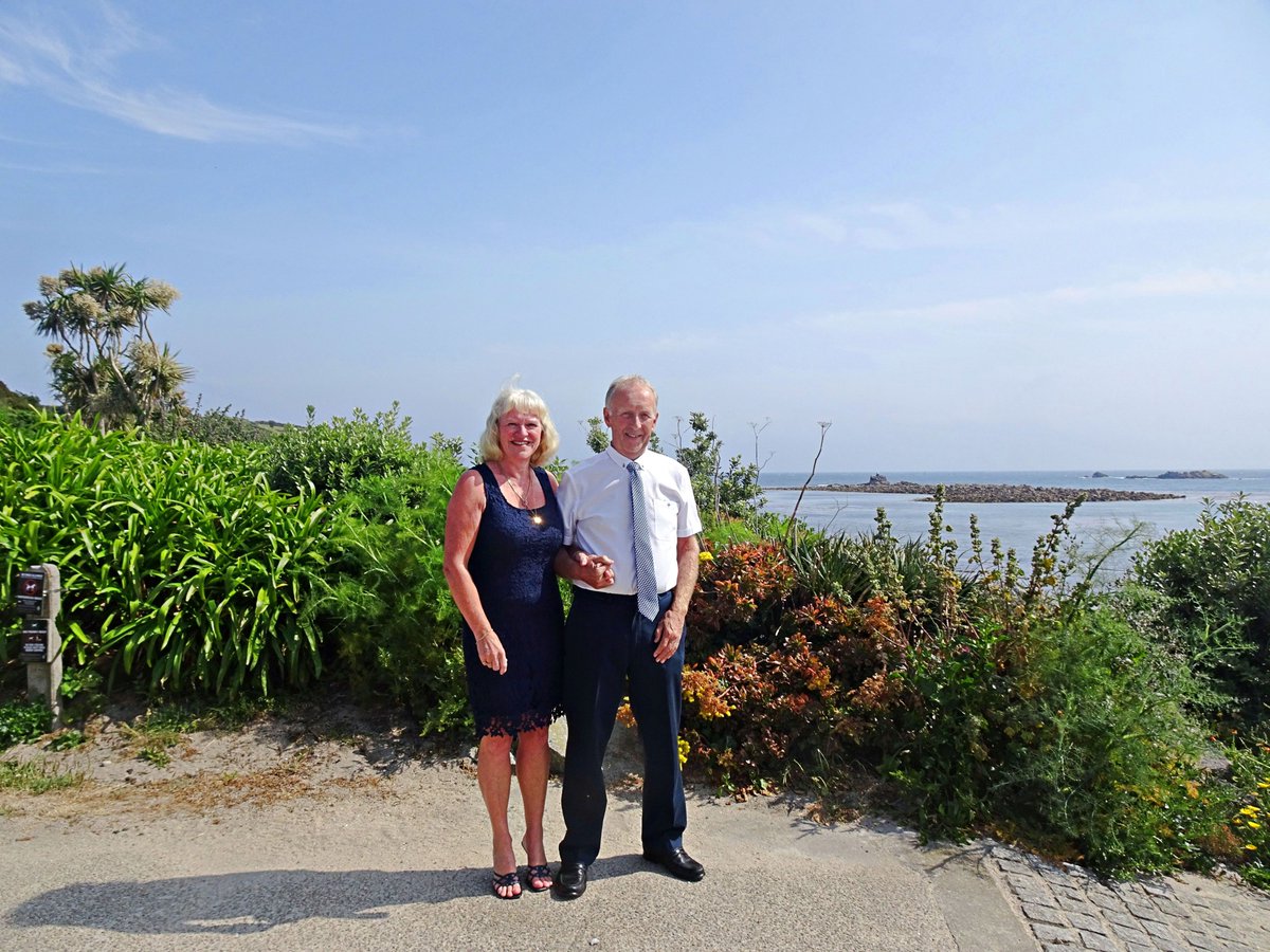 Scillycelebrate's tweet photo. Hello everyone. The sun's shining right now on Scilly and we've been really busy with weddings. Here is one of our lovely couples, Jane and Tony who were married on another sunny day in June, with two local ladies for witnesses.  Congratulations, and hope you enjoyed Scilly. https://t.co/m7yaFJEpKZ