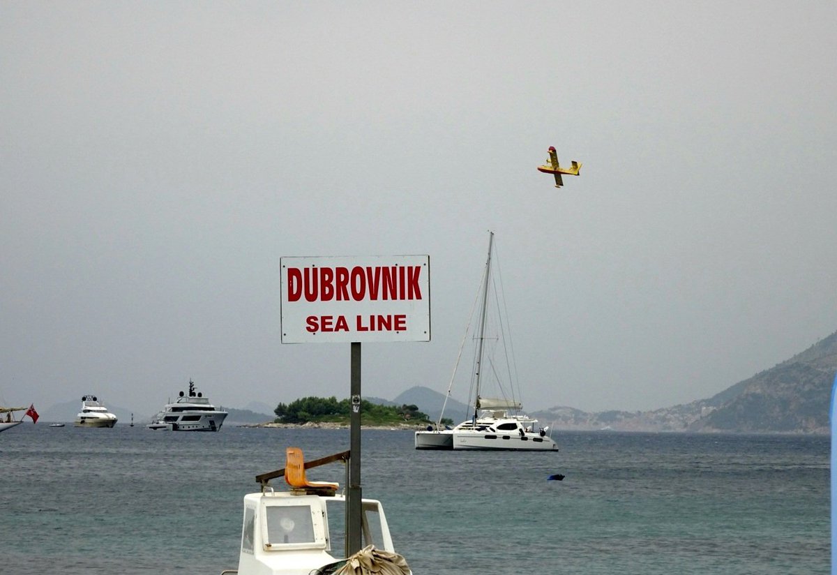 Purplestar21's tweet photo. Watching fire fighter planes from cavat putting out the wildfires in  the Croatia mountains #dubrovnik #cavtat https://t.co/Vbu8l2BD7o
