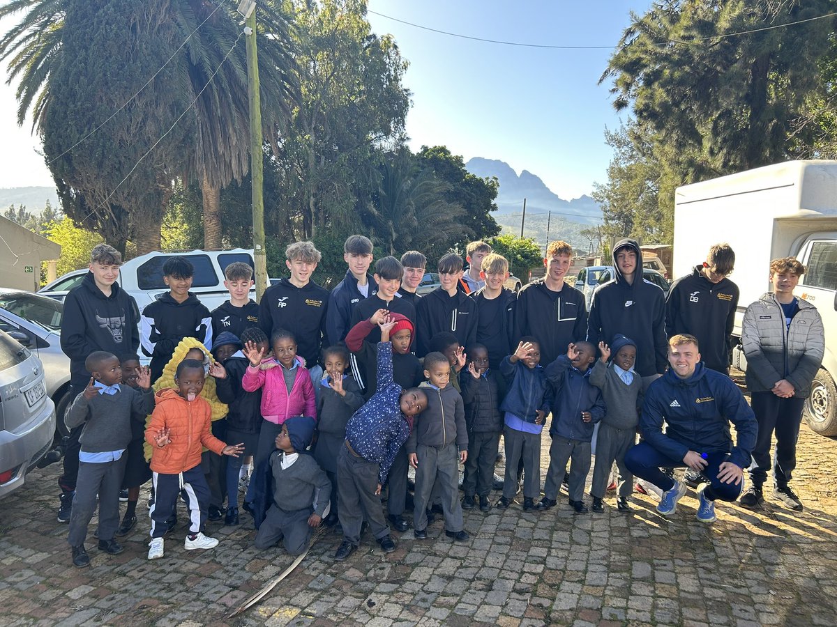 AoM_PE1's tweet photo. A truly eye opening experience this morning at the Kayamandi township, which is home to over 70,000 people. We visited a primary school which was followed by a drumming lesson and a traditional South African lunch. 🇿🇦@DT_AoMSchool @edwindoransport https://t.co/vYQJ92SD4v