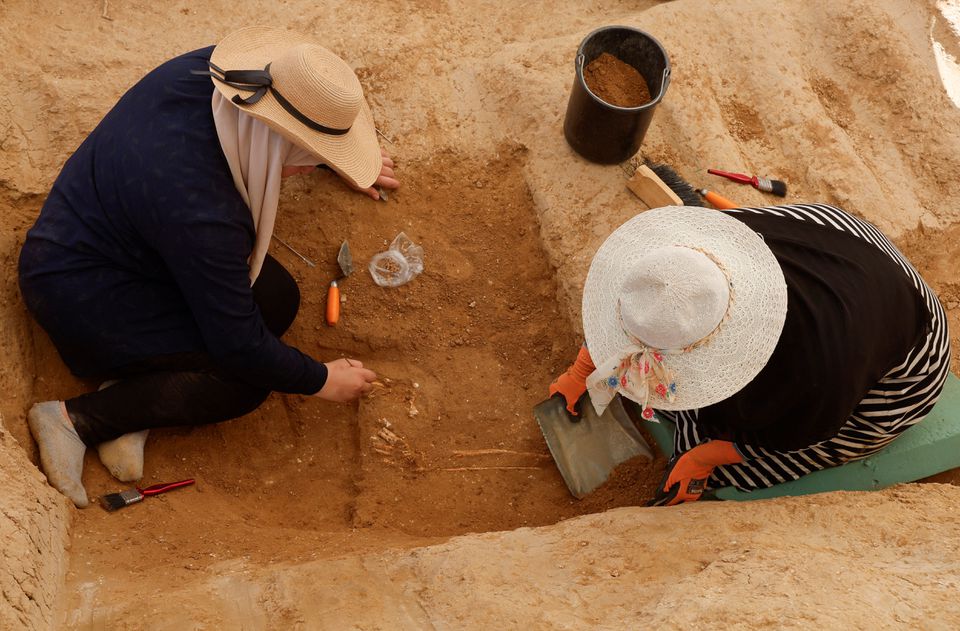 Palestinian archaeologists uncover a Roman-era cemetery in Gaza, July 23, 2023. Photo credit Mohammed Salem