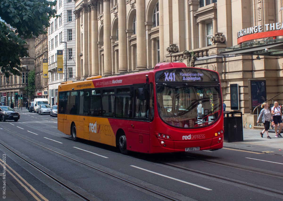 Into the shops @blackburnbusco #RedExpress now serving more of #Manchester on it's way out of the city! 

The Blackburn Bus Company FJ58LTX 1870 seen on Cross Street, Manchester on service X41 to #Ramsbottom then #Accrington