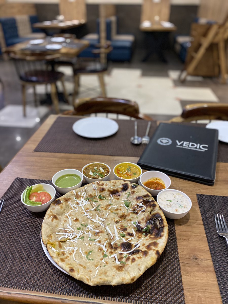 Vedic_restro's tweet photo. Cravings for some Amritsari parantha ?  Order now on zomato or Swiggi. https://t.co/6mb8lyEukz