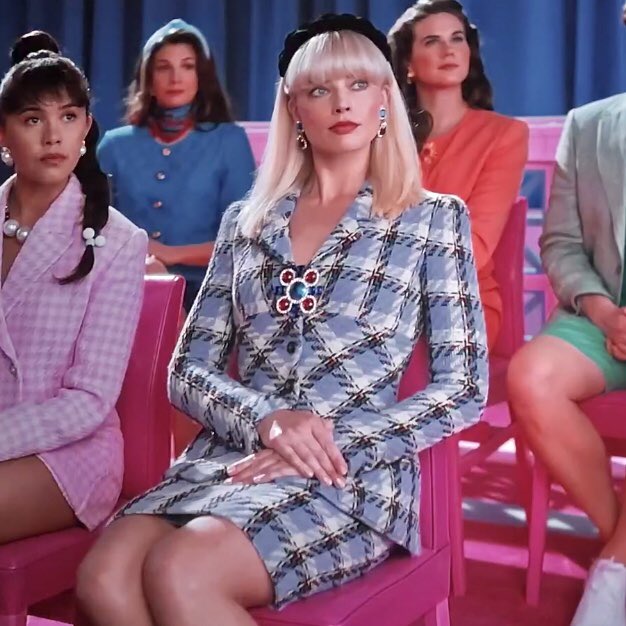 saintdoII's tweet photo. barbie wearing an archival chanel suit that claudia schiffer originally wore in the spring 1995 campaign down to the earrings and little brooch, they completed the look with the addition of a headband . ָ࣪ 𓏲♡ https://t.co/C6Ixl02ntX