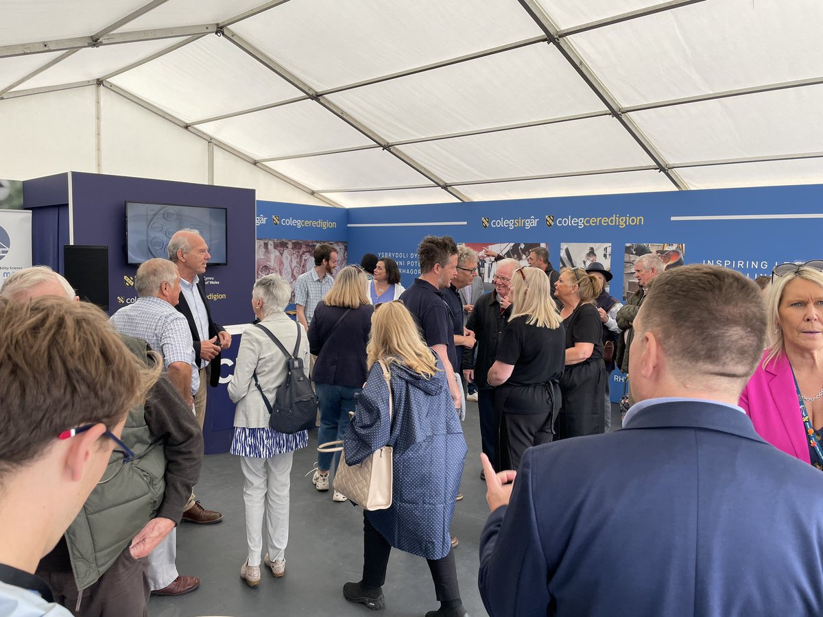 UWTSD's tweet photo. A crowd has gathered on our stand at the  @royalwelshshow to hear about Tir Glas latest developments at @UWTSDLampeter https://t.co/R6DbED0u9f