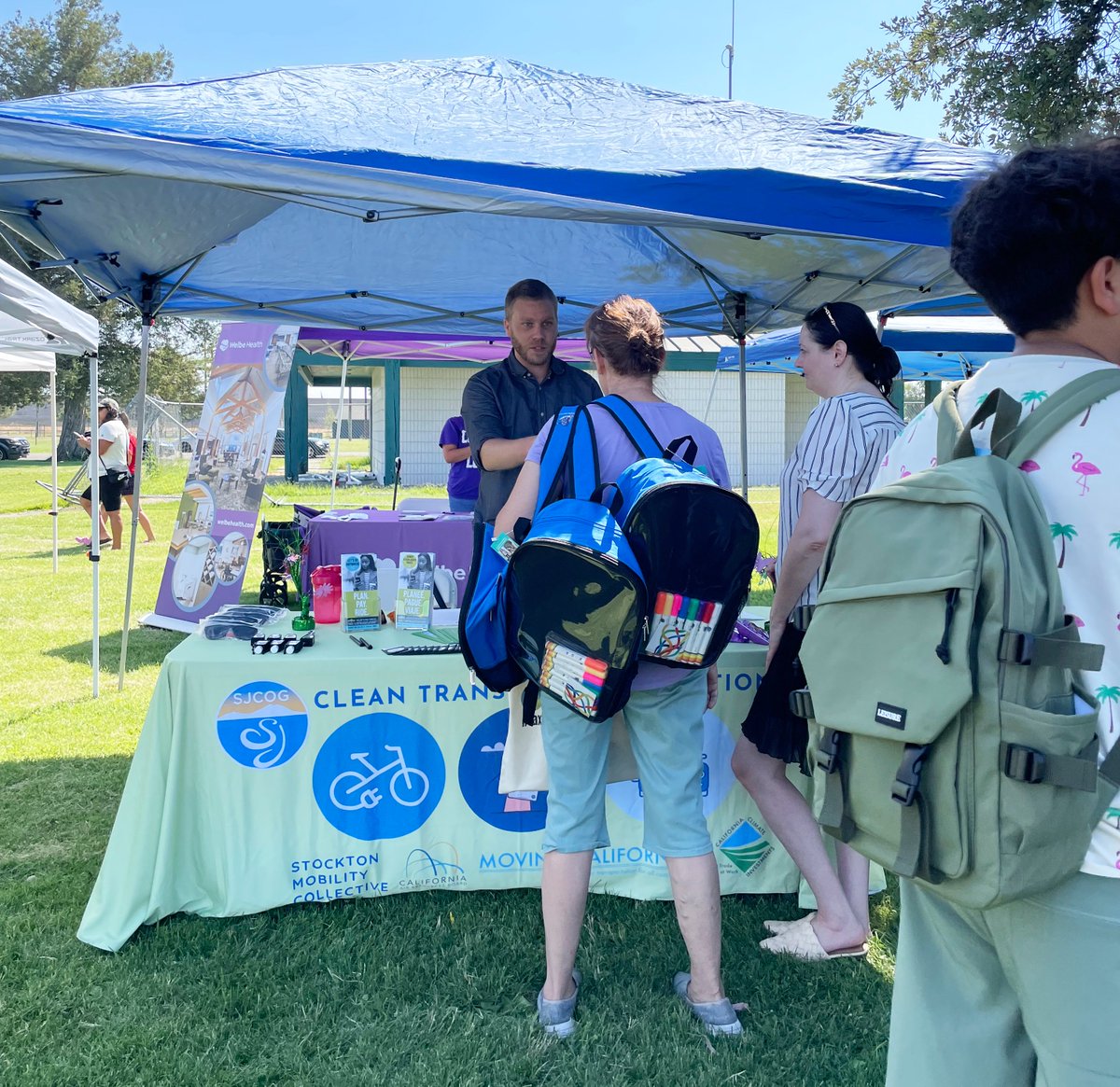 SJCOG's tweet photo. Always fun for @SJCOG & partners to talk about Stockton Mobility Collective. This time at Conway Homes Backpack Jamboree & Resource and Health Fair on Saturday. Learn more: https://t.co/JA01fSZR9T. @CAClimateInvest #capandtrade @InstLocGov @SJCHousingAuth #Miocar #BikeStockton https://t.co/ic6Xcgynui