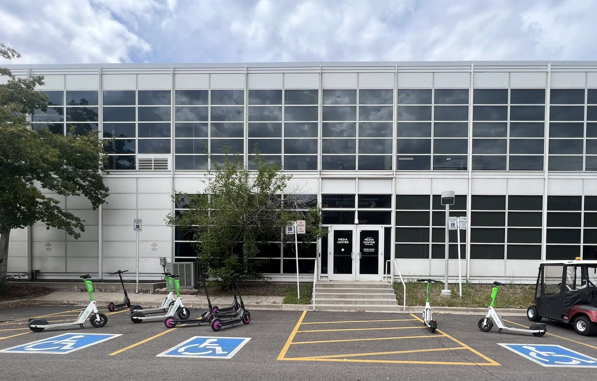 RyanTurch's tweet photo. For the last two weeks, people on the @AurariaCampus have been parking these damn scooters in the handicap spots, blocking access ramps, and piling them in loading zones. Y’all scooter users need to do better. This is unacceptable. @AurariaLibrary @CUDenver @msudenver @CCDedu https://t.co/WfG3xM025v