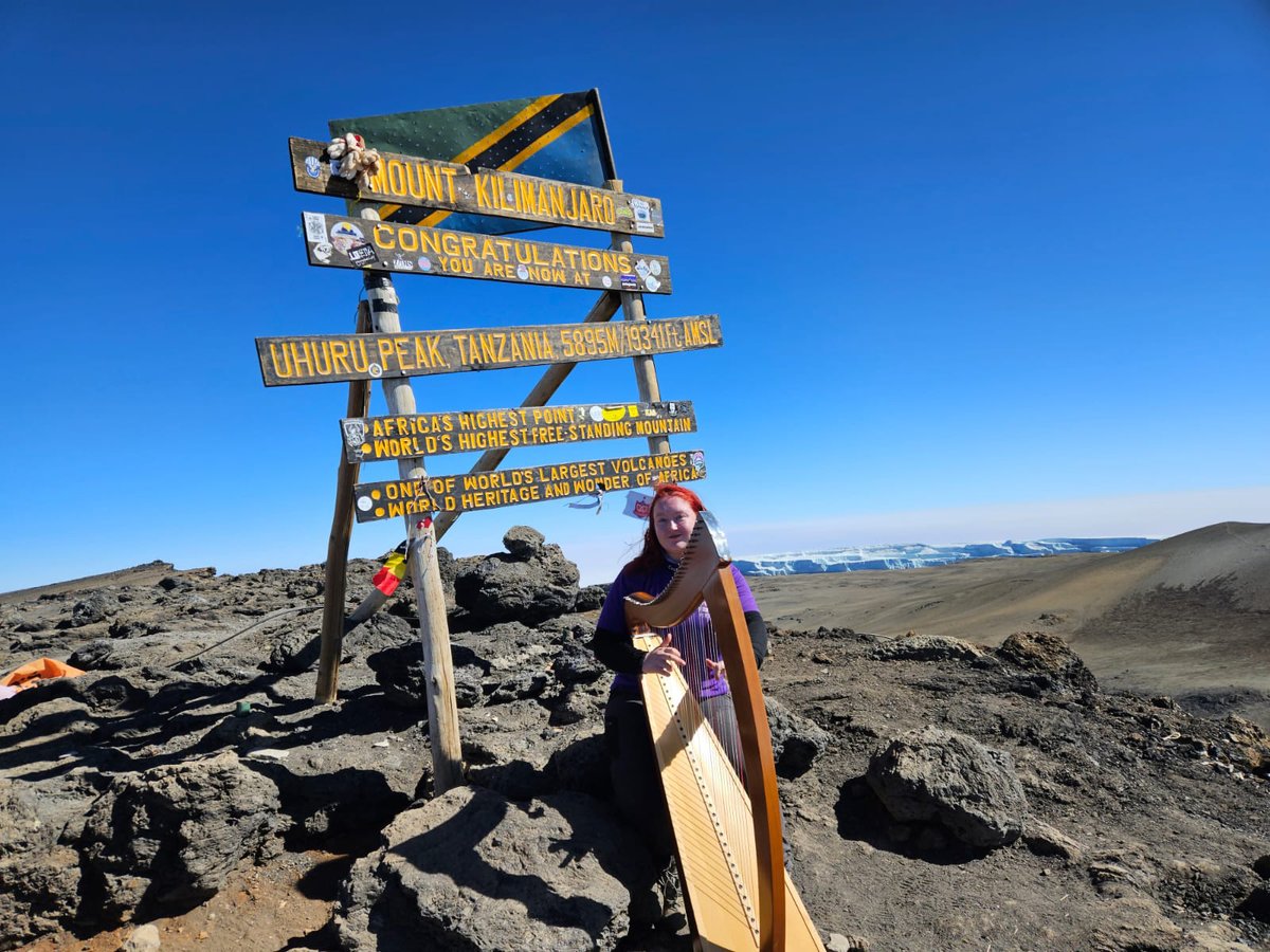 cruiteireann's tweet photo. Congratulations to harper Siobhan Brady who performed 'The Highest Harp Concert' on the summit of Mount Kilimanjaro this morning during the Guinness World Record attempt. @HighestHarp @AibhlinHarp https://t.co/MIaS9lZ2dF