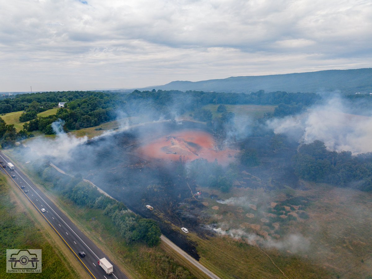 S2AMediaLLC's tweet photo. Photos from the early aftermath of the pipeline explosion in between Strasburg and Toms Brook. You can see the remnants of part of the pipeline in the crater it left behind. 

Contact us for licensing. 

 #djimavic3pro #Strasburg #Virginia  #pipeline #fire #explosion https://t.co/nXwLpULThL