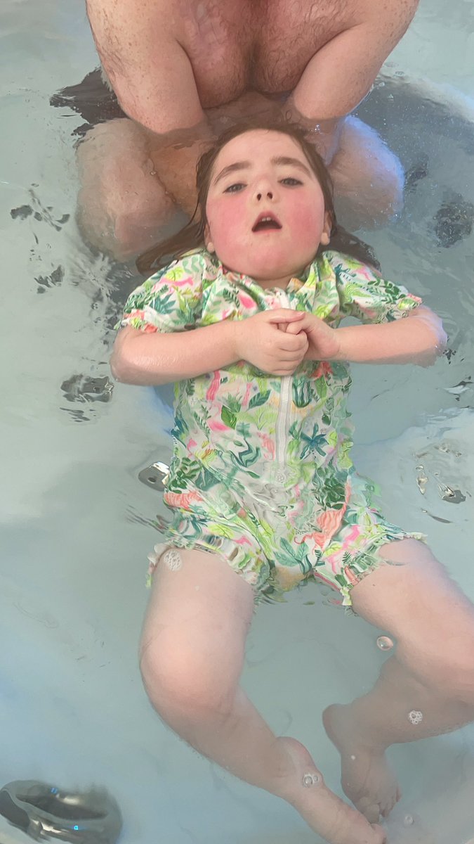 Rett_Penny's tweet photo. I decided to be grumpy tonight, even #TeeandMo wouldnβt calm me dow. the only thing for it was hot tub time with daddy #calming #Rettsyndrome #Thisgirlcan https://t.co/yVXhRFhK9X