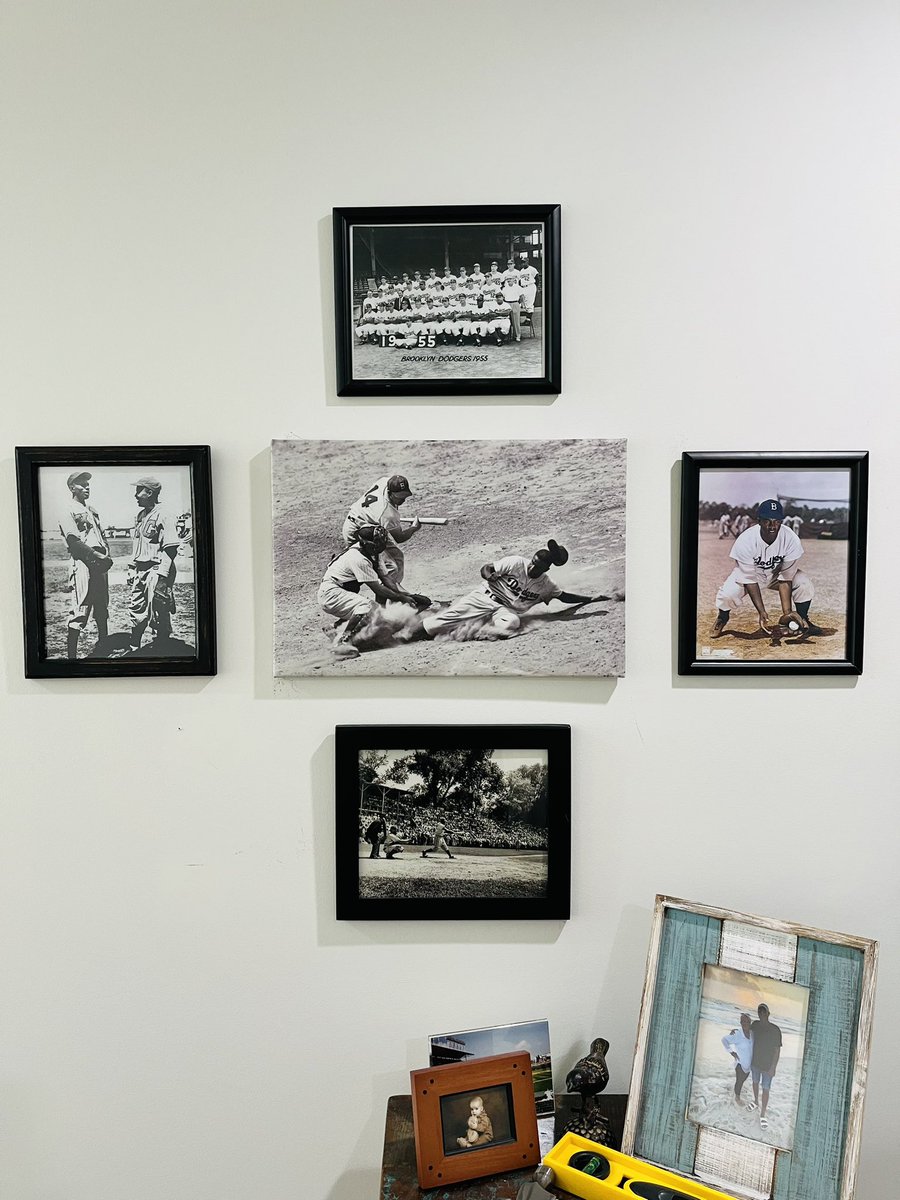 Diamond shape w/my Jackie Robinson portion of 1 of my office walls. Jackie stealing home in middle, hitting at HOF Game at Doubleday Field on bottom, fielding on R, 1955 Dodgers top, Jackie and Satchel on L. @DJGloveRepair @jzulgad @SABRbioproject @NLBMuseumKC @JackieMuseum https://t.co/0WKdjgpbuM