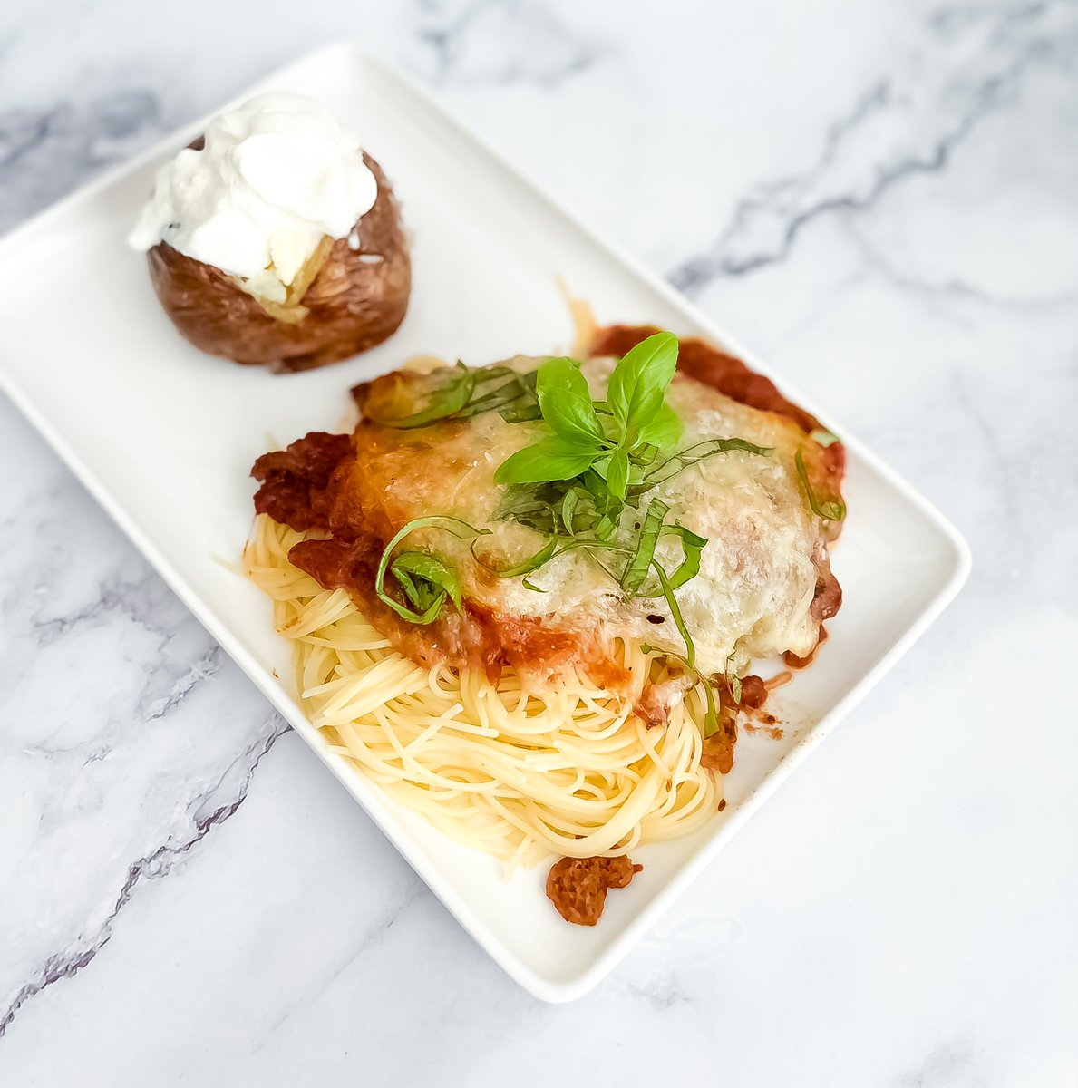 JustLikeGranny's tweet photo. Turning a simple Tuesday into a tantalizing taste experience with some homemade Chicken Parmesan! Crunchy, cheesy, and bathing in rich tomato sauce – it’s the comfort food we all need. Nothing says ‘delicious’ quite like this Italian classic! #ChickenParmesan #FoodLove 🍴🍅🧀🐔 https://t.co/pCSbx33Ik3