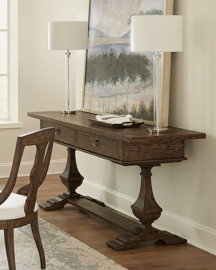 HowardMiller_'s tweet photo. The Wexford Sofa table features a slab top of oak veneer and Mindi solids mounted on a double drawer box supported on two carved bulbous pedestals mounted to a trestle base. These design details add an eclectic dimension.

For more info, visit https://t.co/Qe5qzk3zCc. https://t.co/njBIBfPHqz