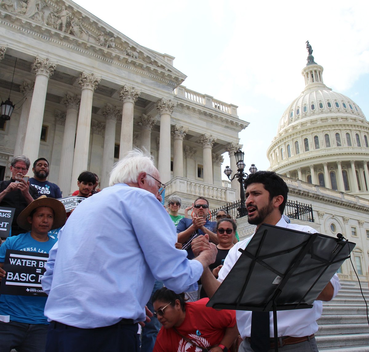 SenSanders's tweet photo. It is beyond belief that in the middle of what is expected to be the hottest year on record, right-wing politicians want to take away basic rights like water breaks.

I was proud to stand w/ @RepCasar today as he holds an all-day vigil &amp; thirst strike for workers' rights. https://t.co/8ArVkxZCQL