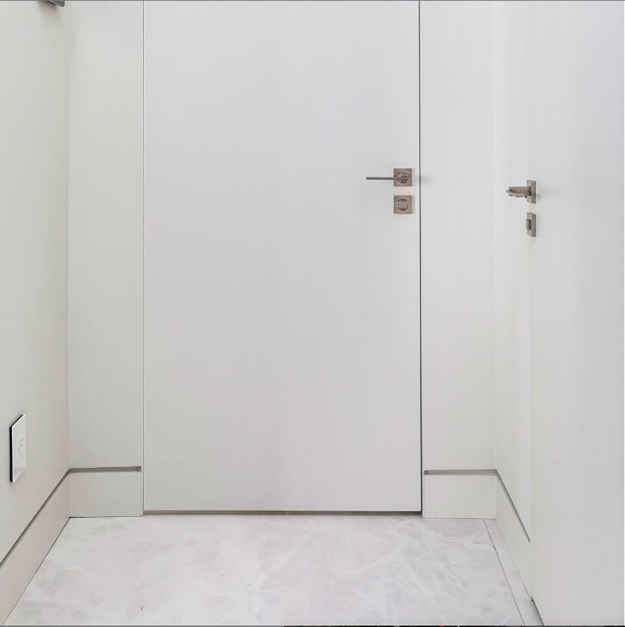 Subtlety brings an understated excellence to this interior space from Milavo Design. Utilising a flush door frame and shadowline skirting to complete this look.
#EzyJamb #DoorJamb #EZConcept #DrywallNation #Architraves #DoorTrims #FlushFinish #DoorFrame #ModernDoorDesign