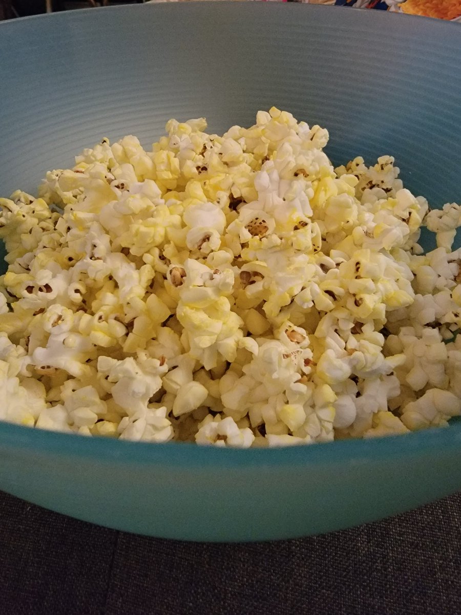 There's always a designated bowl for popcorn. 

It sometimes does double duty as the puke bowl.