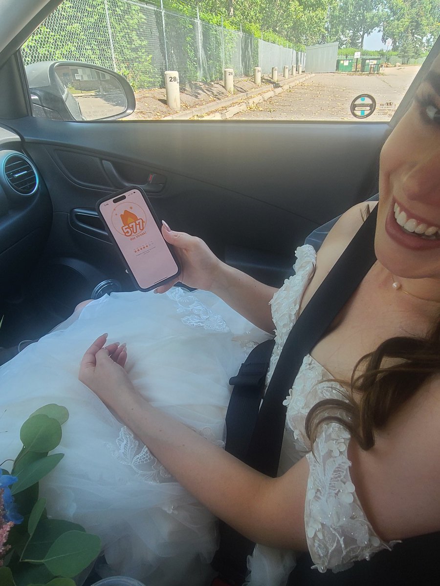 The dedication to my Ukrainian streak is real. Literally 10 minutes before I walked down the aisle, I was getting in my daily lesson. Thanks to my bridesmaid <a href="/MsJenniferRalph/">Jen</a> for thinking that this was a moment to capture. <a href="/duolingo/">Duolingo</a>