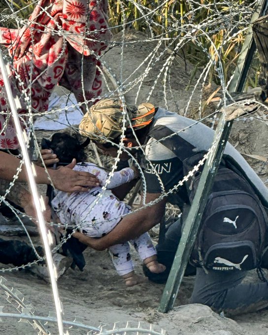 RioHerring's tweet photo. TEXAS GOVERNOR GREG ABBOTT SHOULD BE CHARGED WITH CRIMES AGAINST HUMANITY!

''Push children at risk of drowning into a river filled with razor wire.''

''A 19 year old girl was trapped in the Texas razor wire & had a miscarriage.''

How could they think that killing or injuring anyone trying to seek asylum is not in violation of the international law for refugee protections??
#ProudBlue #DemVoice1 #Fresh