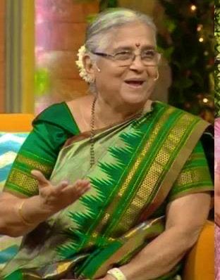 She is Sudha Murthy,
Chairperson of Infosys foundation.

Says she carries food from india while travelling abroad.
As she is “Pure vegetarian”,she fears if same spoon is used for non veg.
While giving this statement,she was seen donning a beautiful silk saaree.

U can’t preach