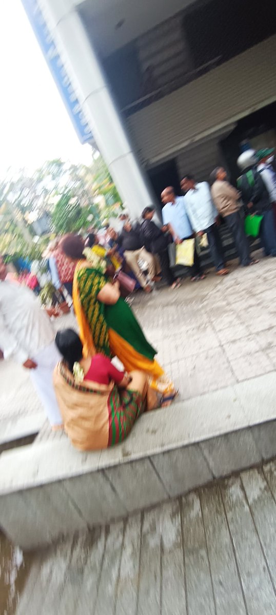 ashwinpck's tweet image. #RBI The national cooperative bank, #gandhibazaar people have queued to get more information and withdraw their hard earned money.
@nsitharaman mam, can you look into it? The senior citizens are getting mad standing in a long queue despite the rain.@RBI