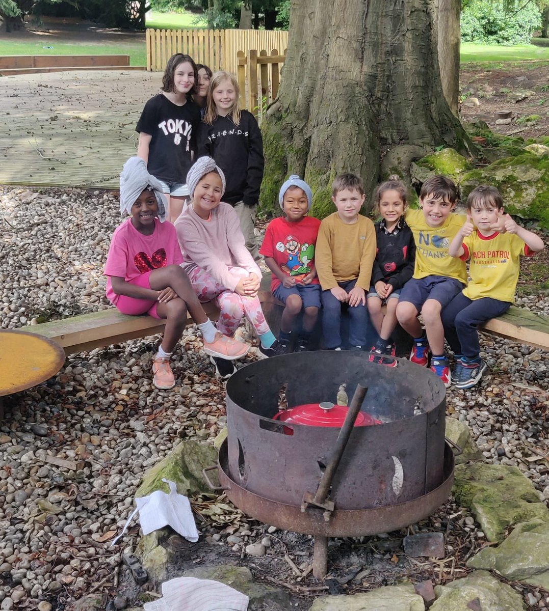 Mr Corrigan was entertaining the children as usual in KC Holiday Club. This time it was slicing and dicing to make cous cous with African spices down in the Dell with our fire pit.