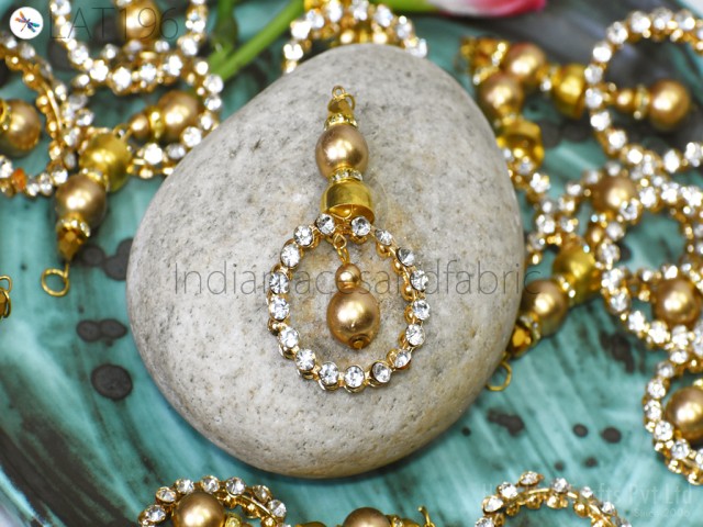 CraftsPvt's tweet photo. Exquisite bridal fabric fit for a fairytale wedding, paired with alluring black and gold tassel earrings that dance with every step. Glamour personified! https://t.co/9qARkZLoDL