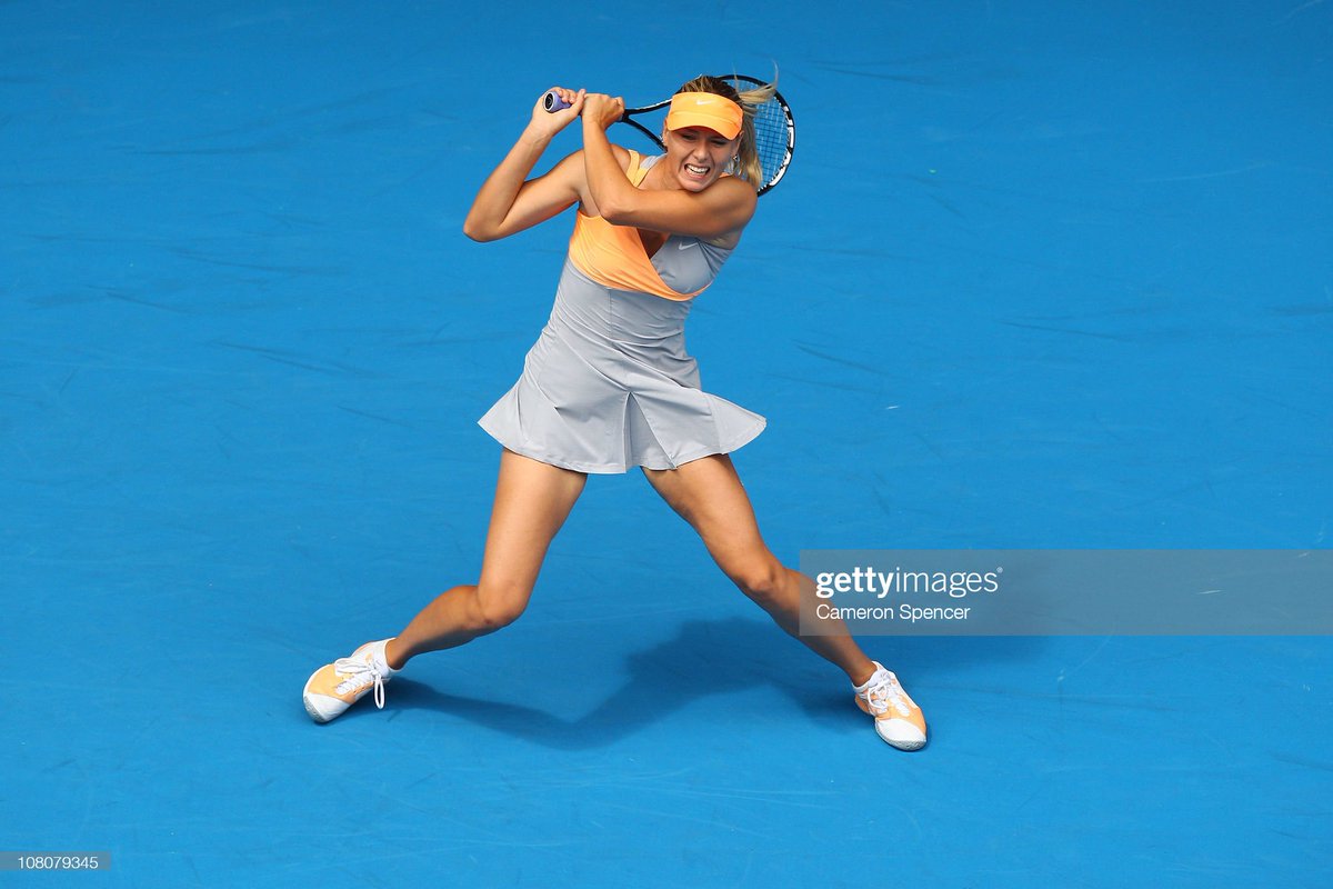 Maria Sharapova of Russia plays a backhand during her first round match against Tamarine Tanasugarn of Thailand during day one of the 2011 Australian Open at Melbourne Park on January 17, 2011 in Melbourne, Australia. (Photo by Cameron Spencer/Getty Images) https://t.co/55WSwuKcKh