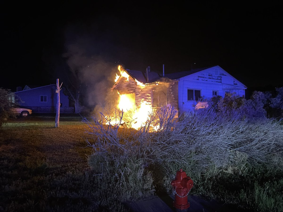 PaysonFire's tweet photo. Payson Fire &amp; Rescue, Payson Police, and Salem Fire were dispatched to a structure fire at 983 East 300 North, Payson at 23:18. One male was displaced from his home.  Fireworks tipped over shooting into large evergreen shrubs in front of the house catching them on fire. https://t.co/9x6YtgbNtI