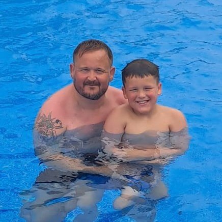 Shaunruck33's tweet photo. This photo sums up everything that my tx has given my family.

All my son wanted is to have his dad in the pool teaching and playing with him without my central line.

My kids have never wanted anything other than to have me with them having fun

Tx gave them their dad back 💚 https://t.co/uU5xW6F0vL