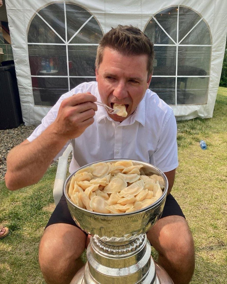 Ryan #Craig, assistant coach of the #Vegas Golden Knights eating #varenyky from the Stanley Cup in #Brandon, #Manitoba