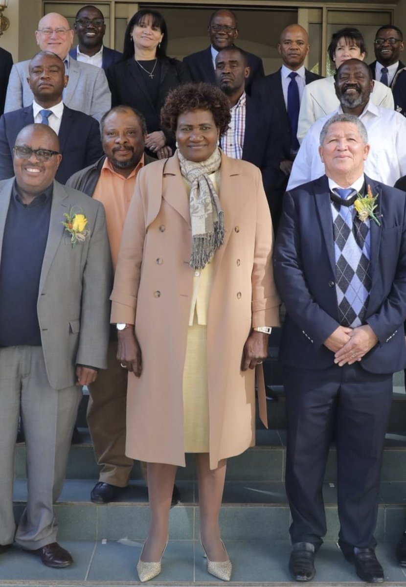 Quizzing Quiz; what do you think the Minister is holding tight in her hand?