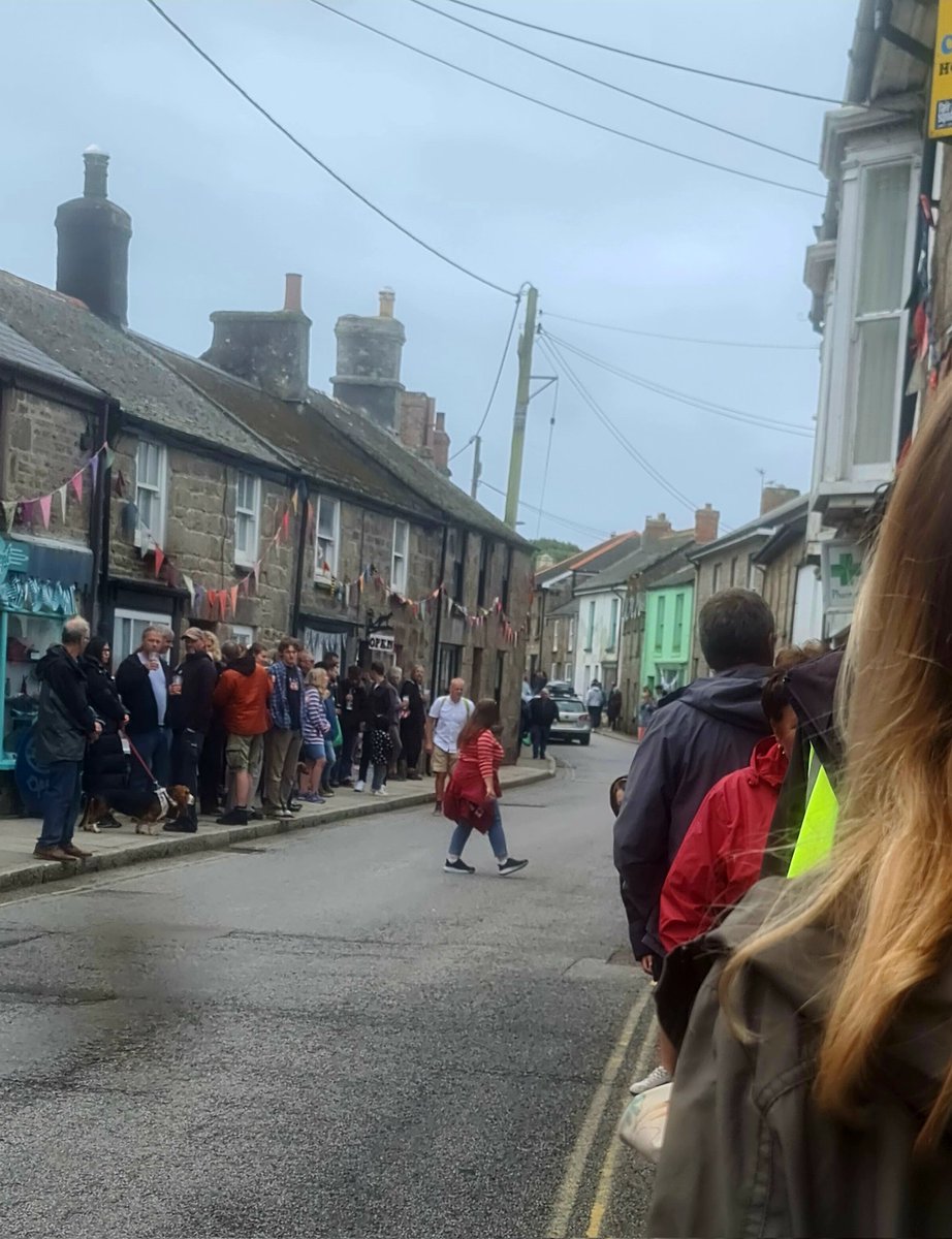 gnome_alice's tweet photo. #Lafrowda gravity buggy racing down Fore Street. Too boxed in to photograph the action. But, look, #StJust does turn out for events, even at 4:30 on a Friday afternoon.
#Lannust
#Kernow https://t.co/7T5WIIECDi