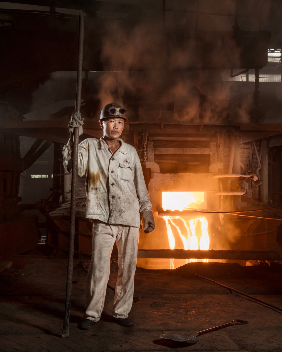 Pyongyang, 2018. Ji Jong Ho poses in front of an oven during a fusion casting at Chollima Steel Complex, outside Pyongyang. By @stephan_gladieu 🇰🇵