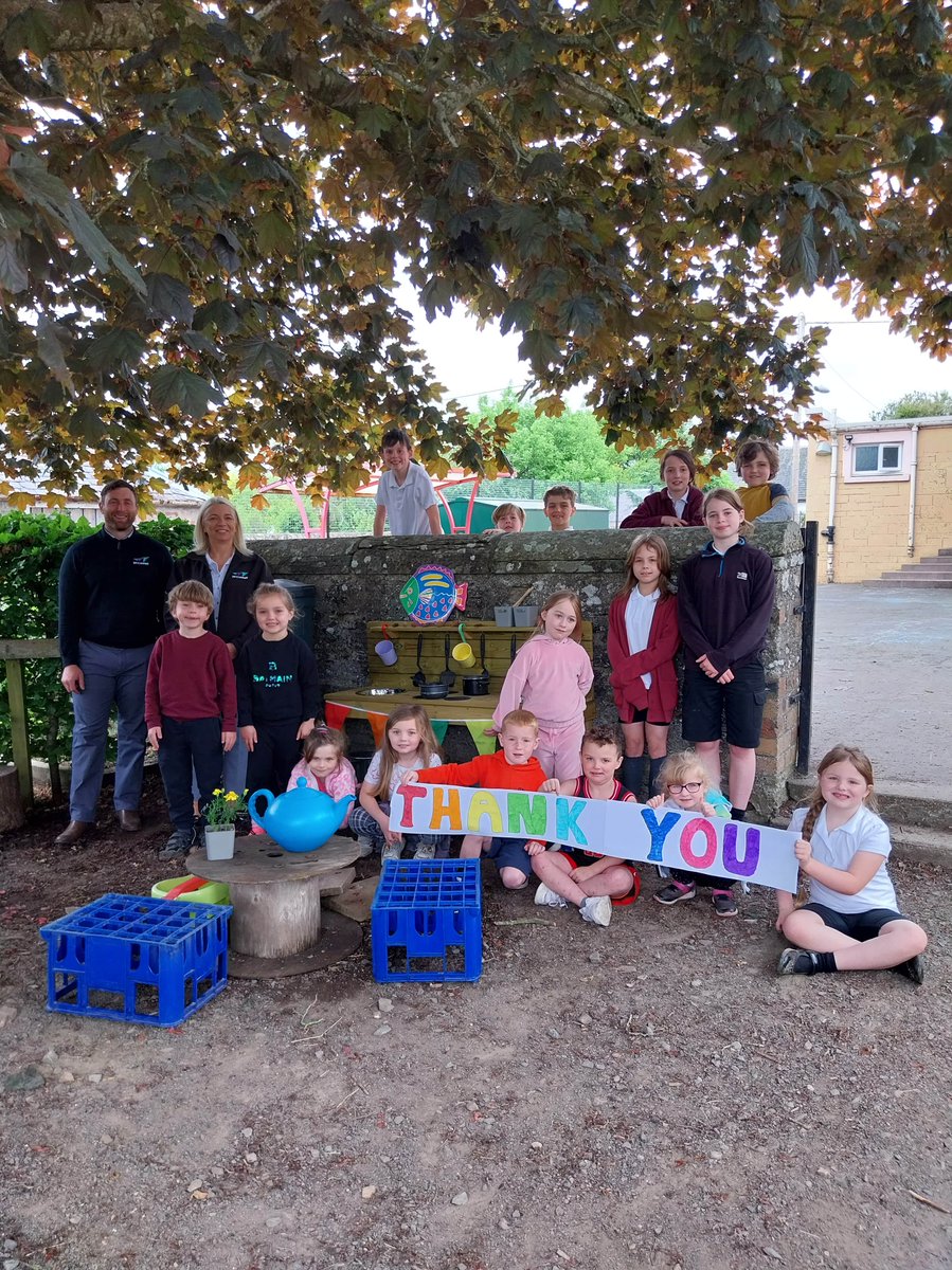 PerthandKinross's tweet photo. Pupils/staff at @GuildtownPS were delighted to receive two mud kitchens from contractors, Hugh LS McConnell Ltd.

The pupils gave a thank you card/banner for the contractor. Mud kitchens were donated as a community benefit and as part of the External Fabric Upgrades 6 Contract. https://t.co/jxSxobPVxr