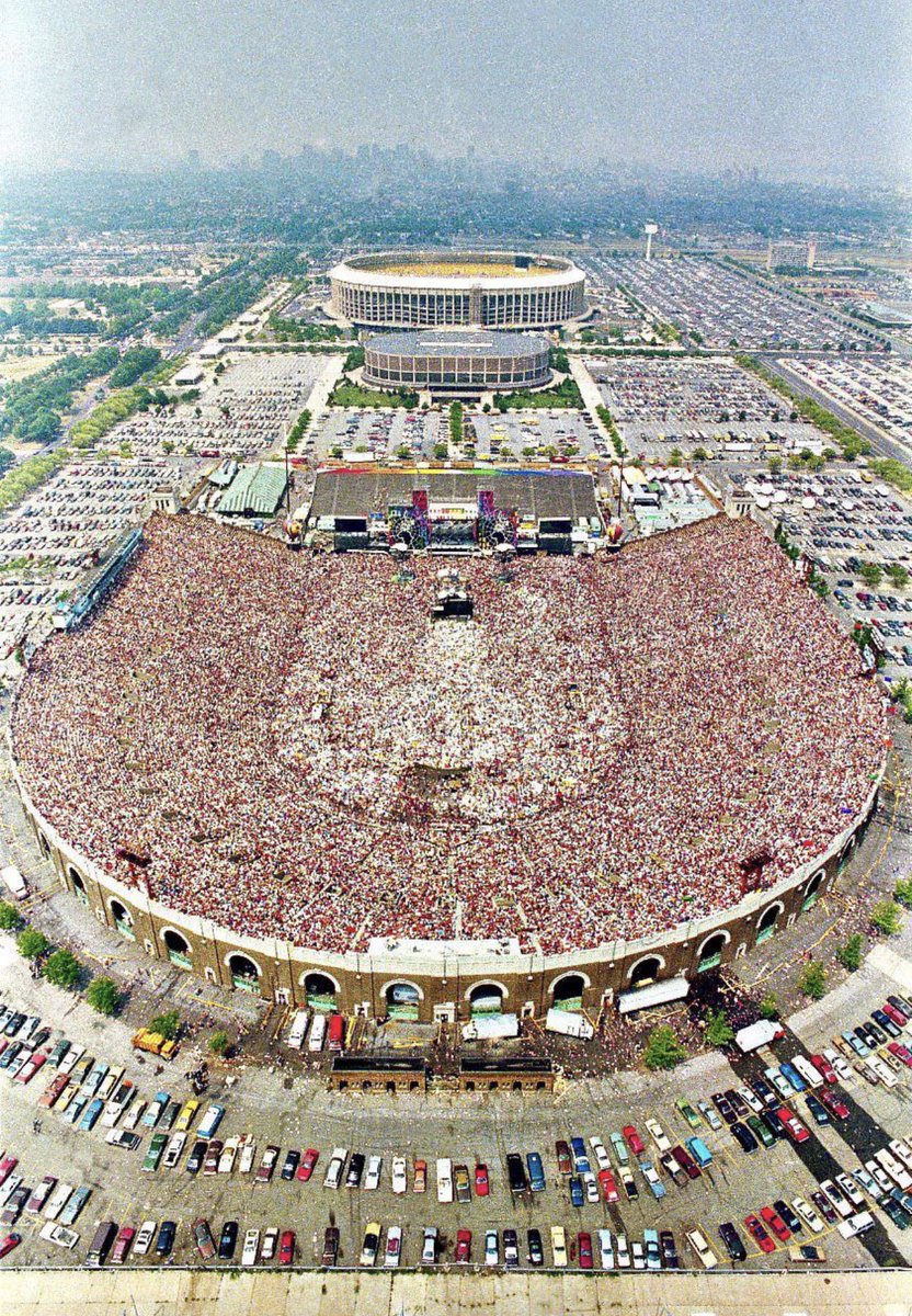PHLEaglesNation's tweet photo. The Philadelphia Sports Complex 38 Years Ago Today, over 89,00 people packed at JFK Stadium for Live Aid. https://t.co/99wbjroWN1