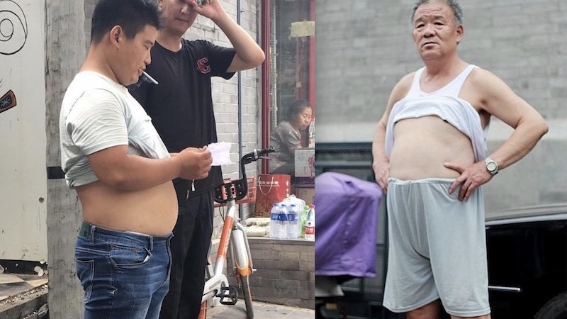 ObtainerOf's tweet image. Every year brave Chinese men battle local authorities for their right to proudly wear the “Beijing Bikini”, the thinking man’s preferred method of beating summer heat