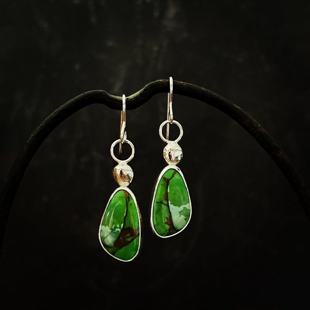 Ordnance Earrings by Alf. Apple green stones shot through with copper and set into sterling silver mounts. The earwires are also sterling silver. #contemporaryjewellry #sterlingsilver #jewelleryart #supportlocalbusinesses #green #earring #tonbridgegallery #kentjewellerymaker